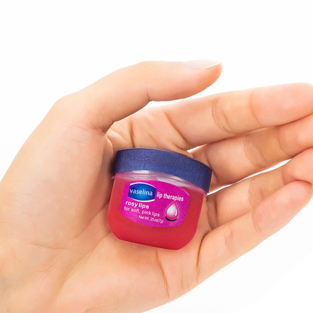 Vaseline lip balm on hand