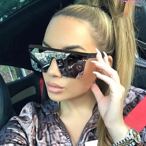 a girl wears sunglass